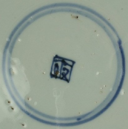 2010622 Square shop mark in a double circle, underglaze blue.